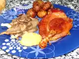 Receta Confit de pato con patatas a la sarladaise, compota de manzana y setas.