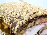 Receta Brazo de gitano de chocolate y crocanti relleno de nata y frambuesa (y 6000 visitas)