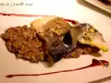 Receta Lubina al horno sobre risotto de setas y vino tinto
