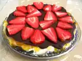 Receta Tarta de queso con mermelada de naranja y chocolate (las fresas son de propina).