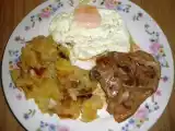 Receta Patatas fritas en ajo cabañil con cordero y huevo frito