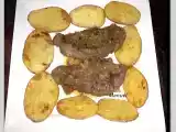 Receta Solomillo de cerdo y papas asadas al horno.