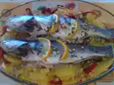Receta Lubina al horno con patatas y verduras