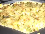 Receta Pizza de cebolla, guisantes y toque de lechuga