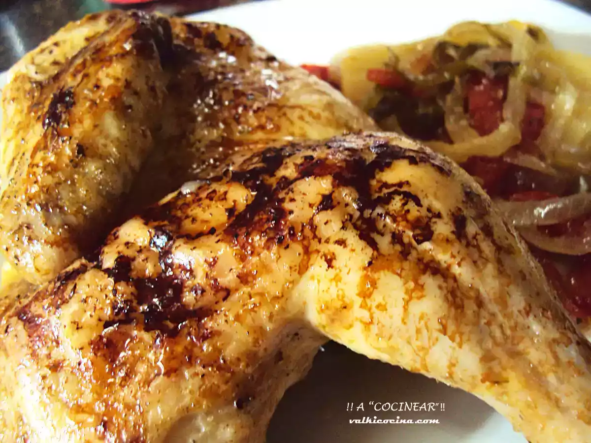 Coquelet o pollo tomatero al horno con guarnición