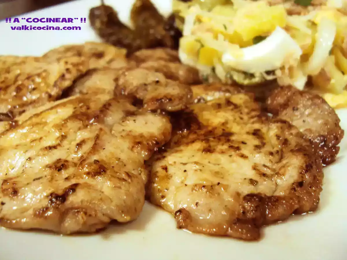 Filetes de solomillo de cerdo espalmados a las especias