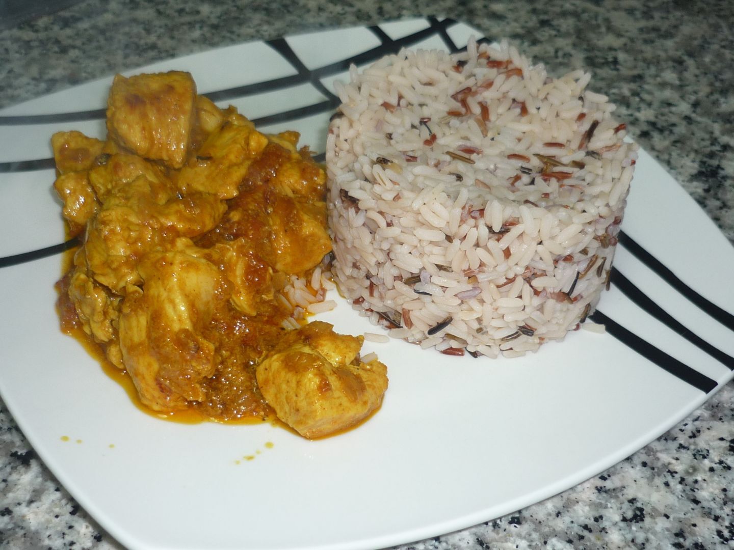 Pollo al curry con arroz salvaje. - Receta Petitchef